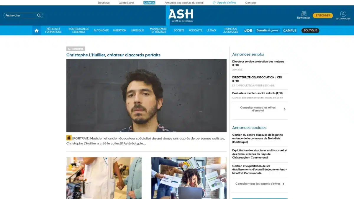 Un homme à la barbe et aux cheveux sombres, en gros plan.